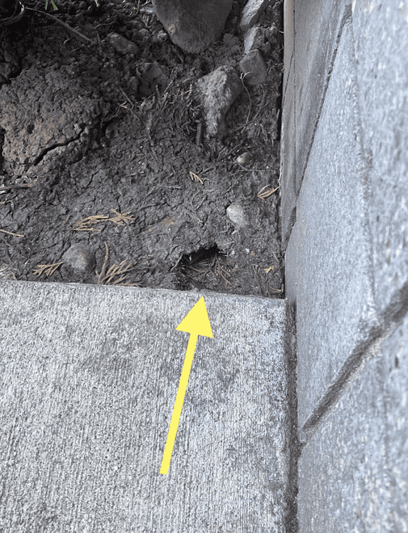 Soil erosion near foundation causing pest entry points in Campbell Natural Pest Control service area.